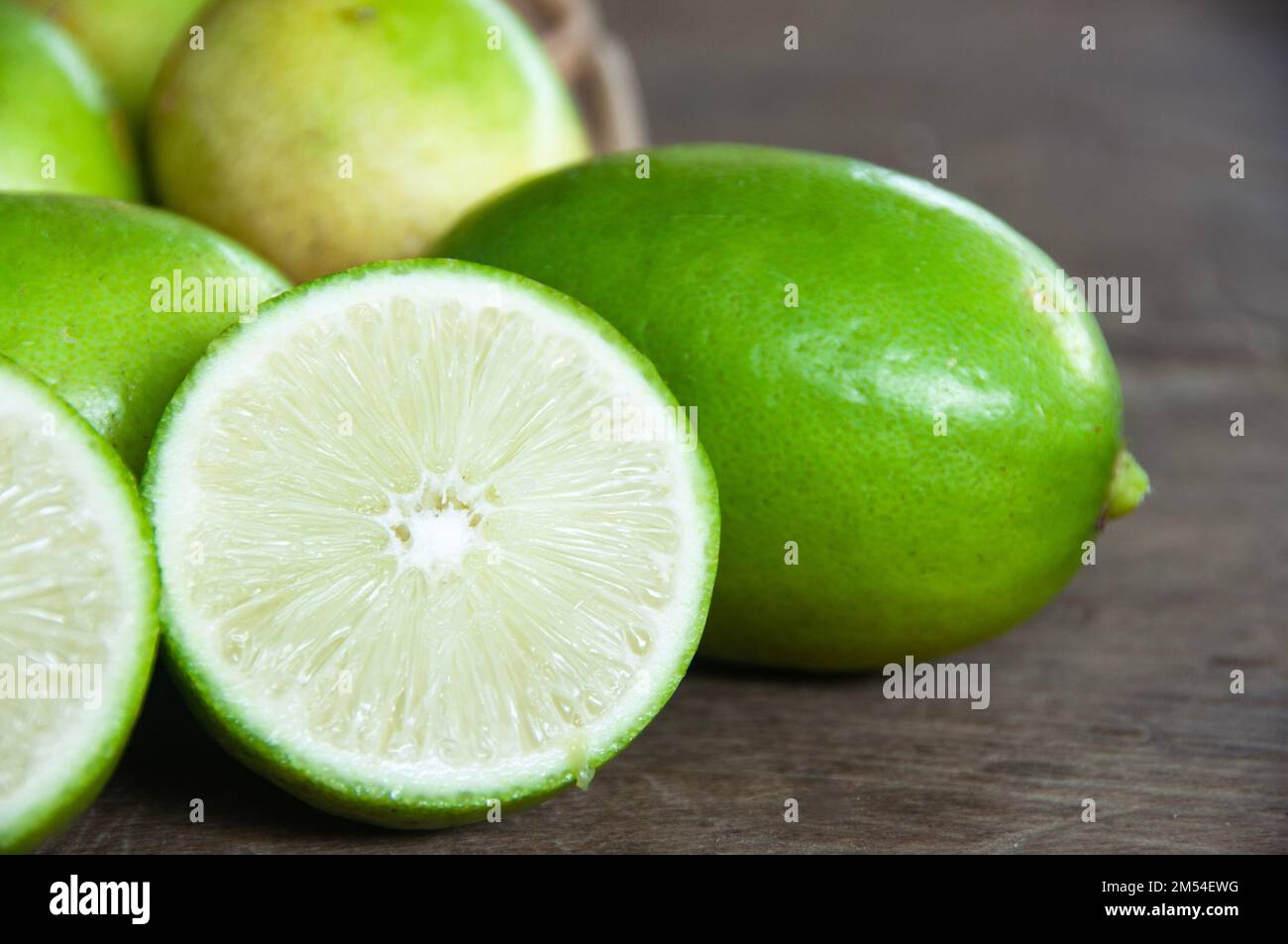 Close up of lemons on wooden basket. Asian food concept Stock Photo