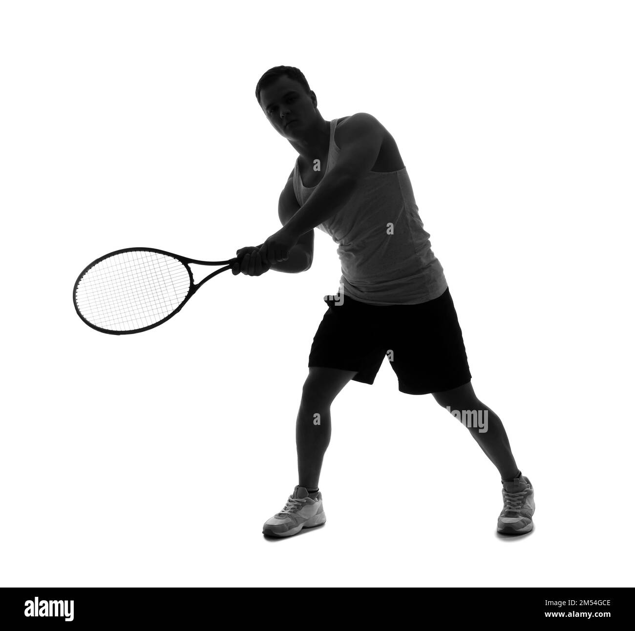 Silhouette of young man with tennis racket on white background Stock Photo