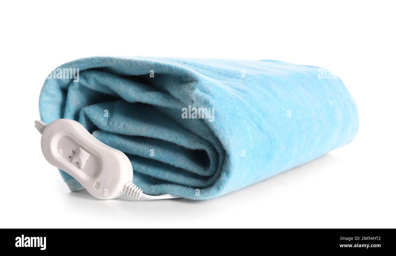 Folded electric heating pad with controller on white background Stock Photo