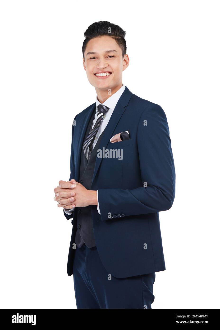 The perfect corporate image - polished and professional. Studio portrait of a confident young businessman posing against a white background. Stock Photo