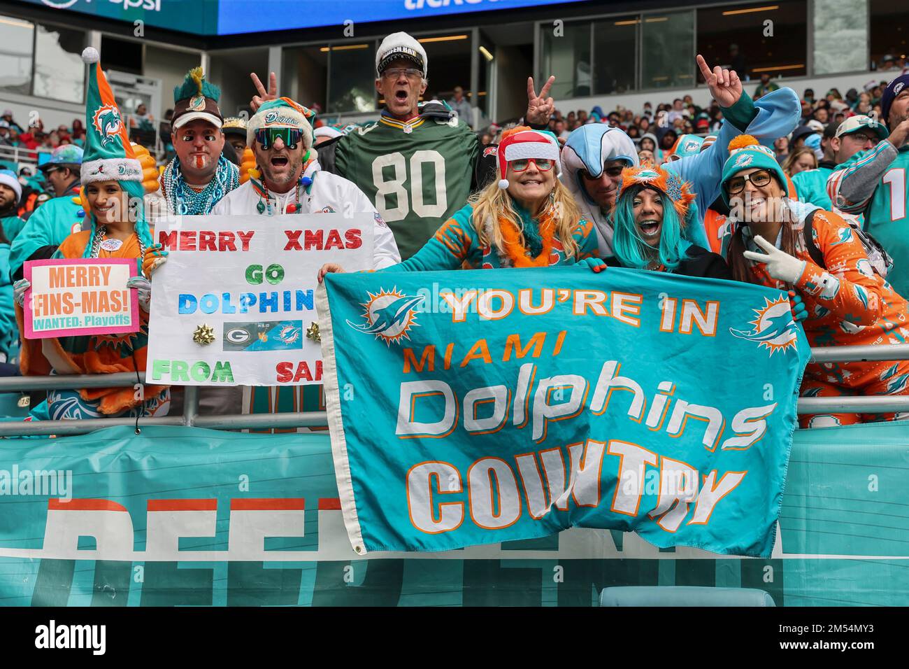 Miami. FL USA;  Miami Dolphins and Green Bay Packers fans cheer on their teams on Christmas Day during an NFL game at the Hard Rock Stadium, Sunday, D Stock Photo