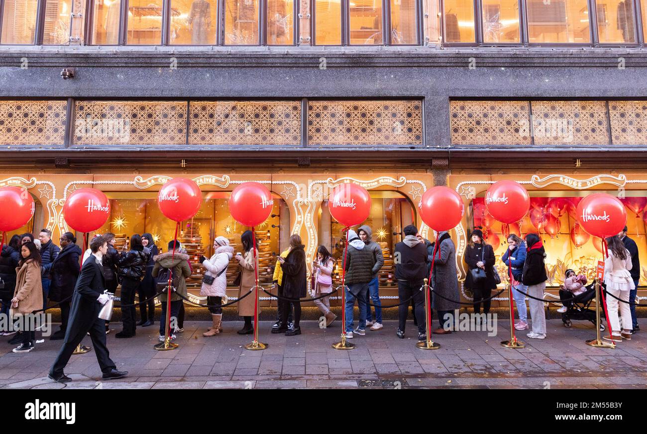 EDITORIAL USE ONLY Customers queue outside Harrods in Knightsbridge