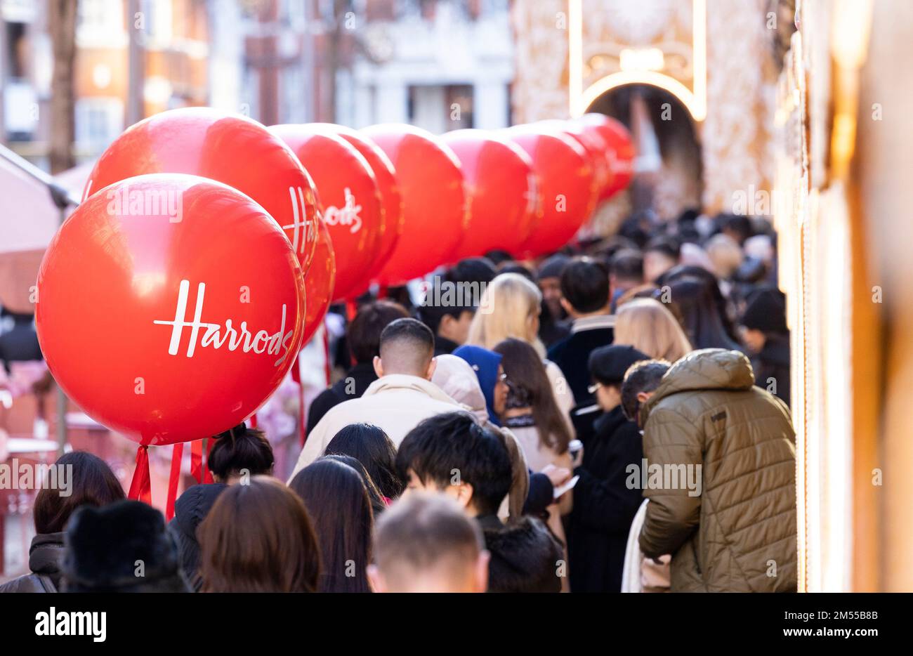 EDITORIAL USE ONLY Customers queue outside Harrods in Knightsbridge