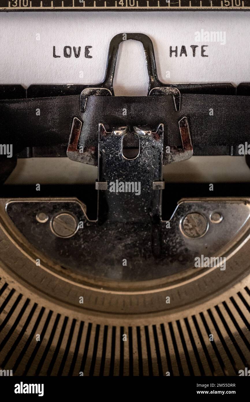 Love and hate words written on a vintage typewriter Stock Photo - Alamy