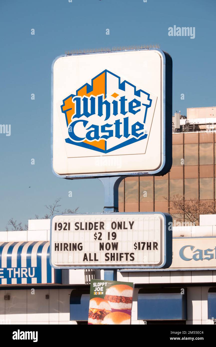 Signs outside White Castle offering jobs & touring the noslgic 1921 slider. In Bayside, Queens, New York City. Stock Photo