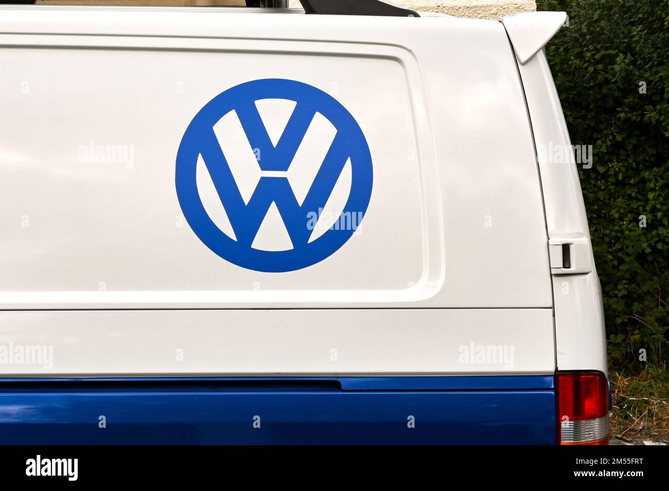 Newport, Pembrokeshire, Wales - August 2022: Close up view of the sign on the side of a Volkswagen VW Transporter van Stock Photo