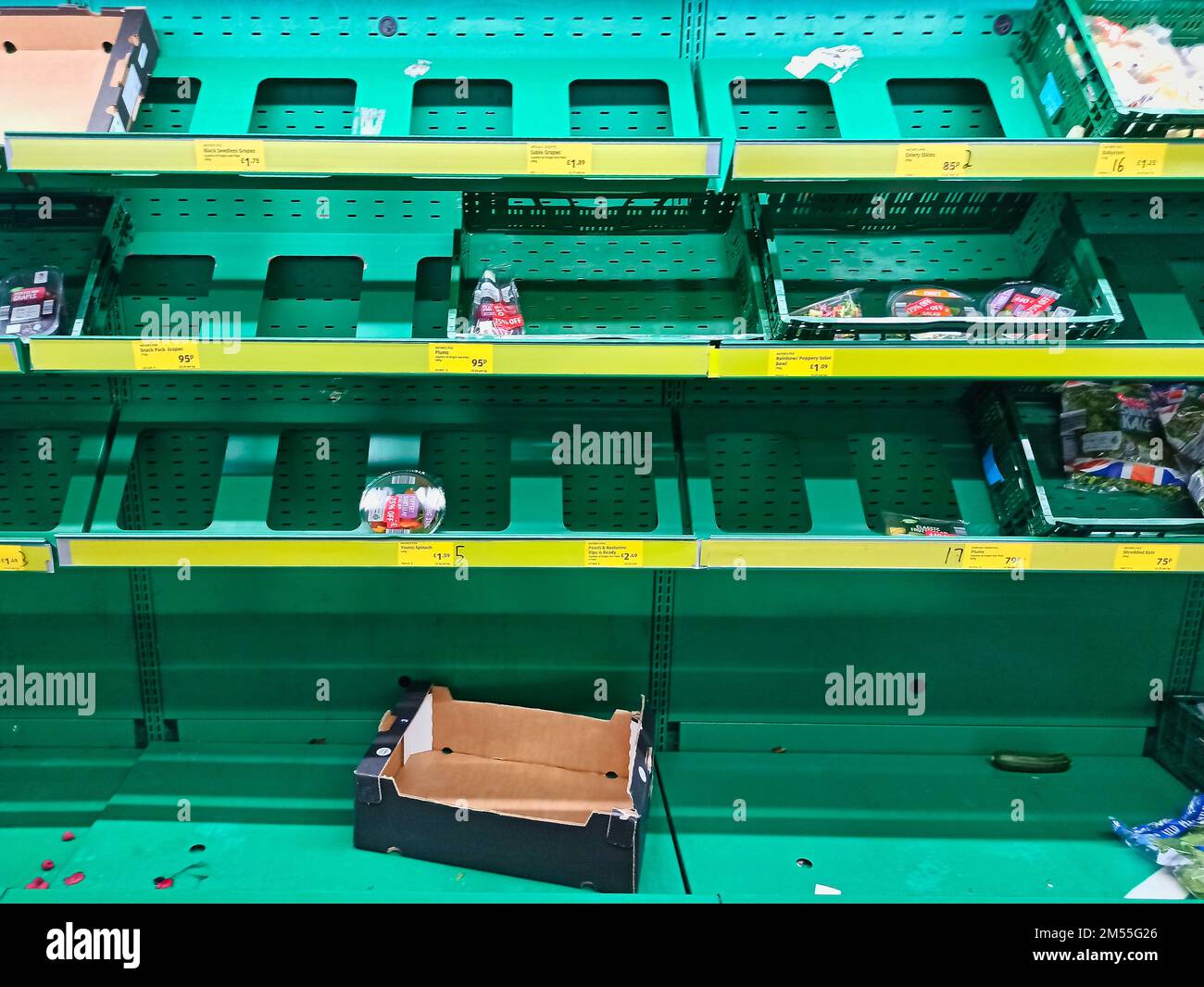 Empty shelves in a high street supermarket. These shelves would