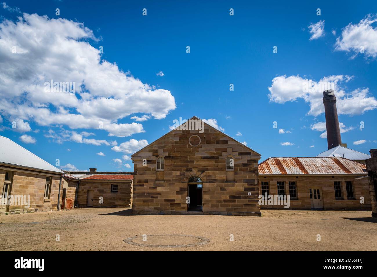 Administration buildings of the former convict prison, Cockatoo Island, a UNESCO World Heritage at the junction of the Parramatta and Lane Cove River Stock Photo