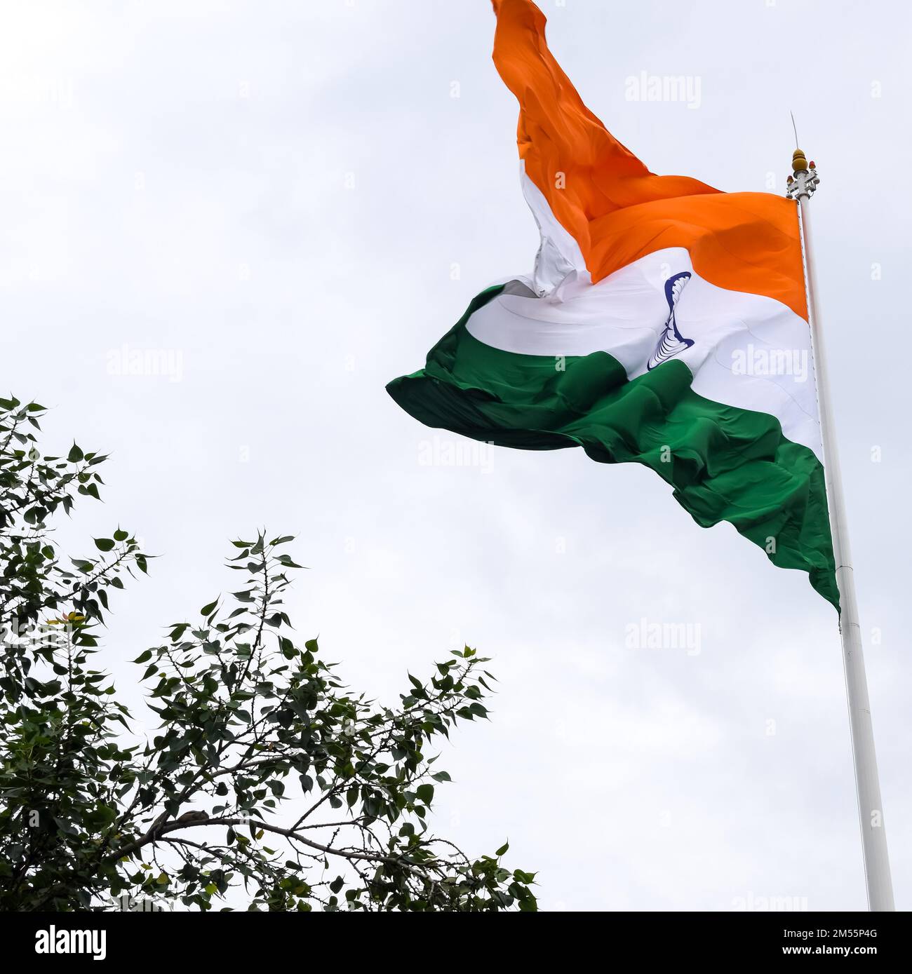 India flag flying high at Connaught Place with pride in blue sky, India ...