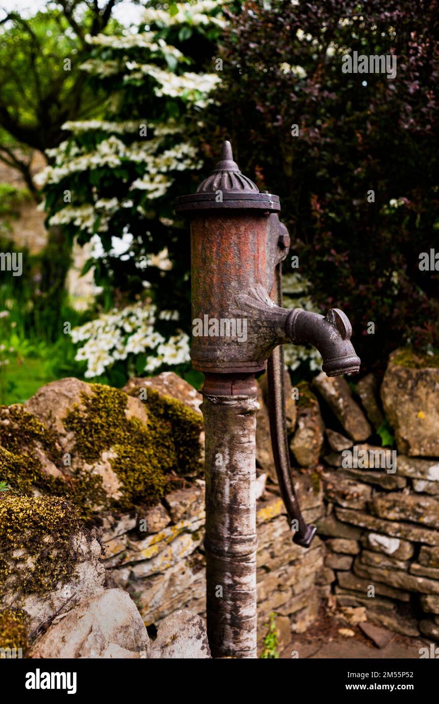 Old castiron water pump in the once farming community of Naunton, a