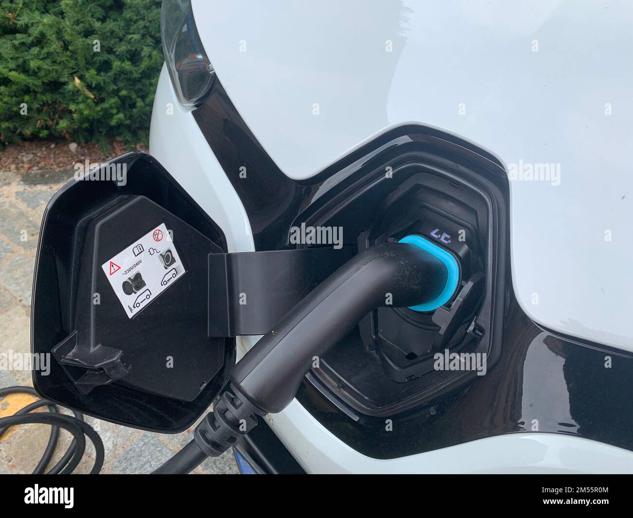 Electric car charge, EV Car or Electric vehicle at charging station