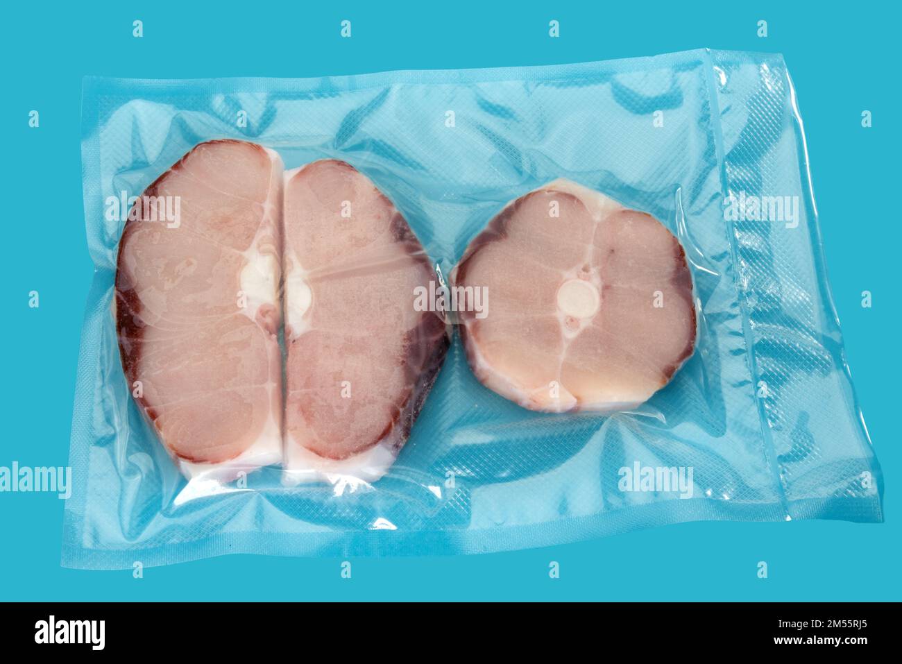 Slices of blue shark fish in vacuum packed sealed for sous vide cooking