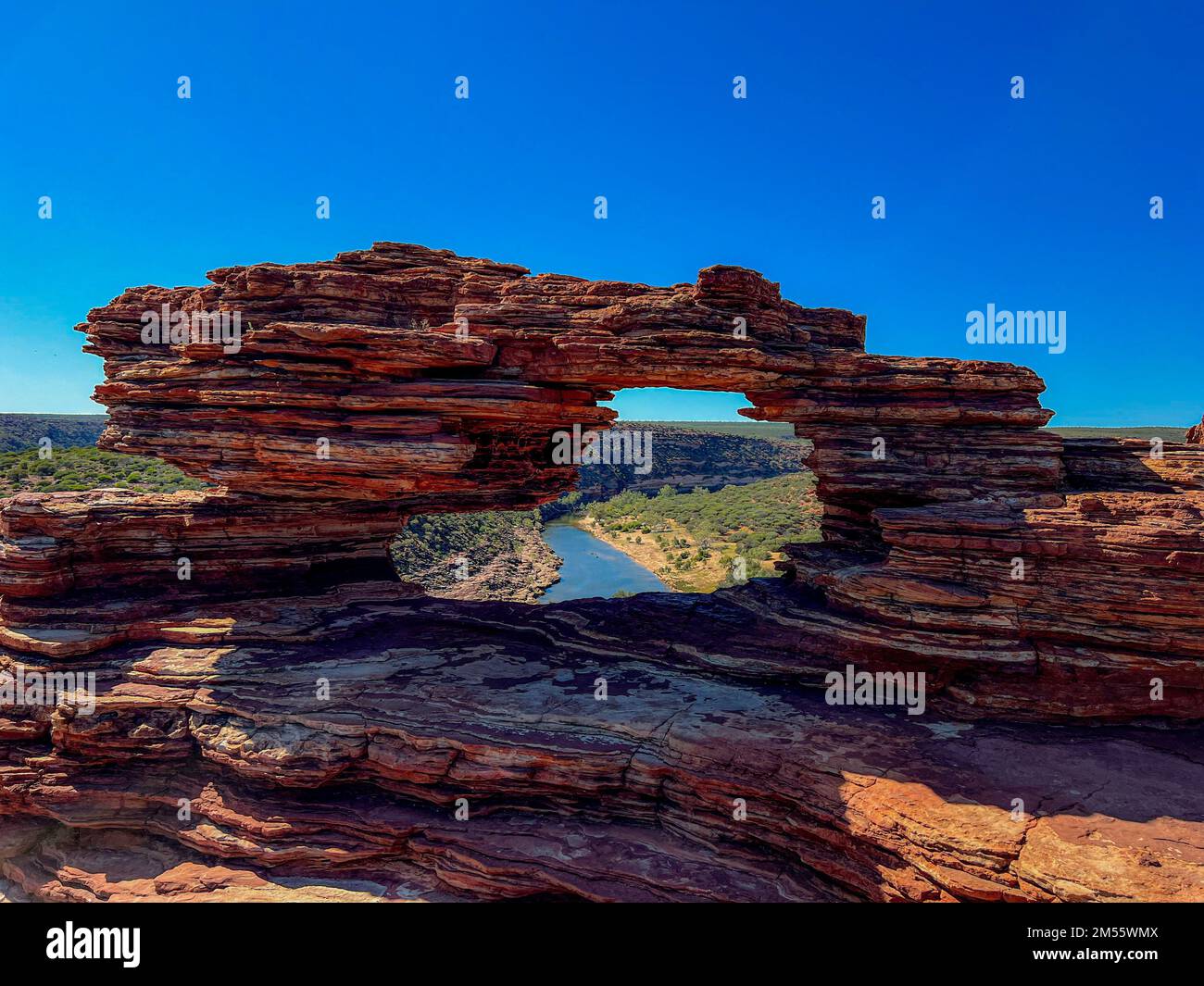 A rock formation with a hole in the middle of it Stock Photo - Alamy