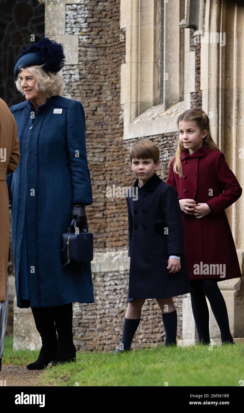 Sandringham, UK. 25 December, 2022.  Camilla, Queen Consort, Prince Louis and Princess Charlotte attend the Christmas Day service at Sandringham Churc Stock Photo