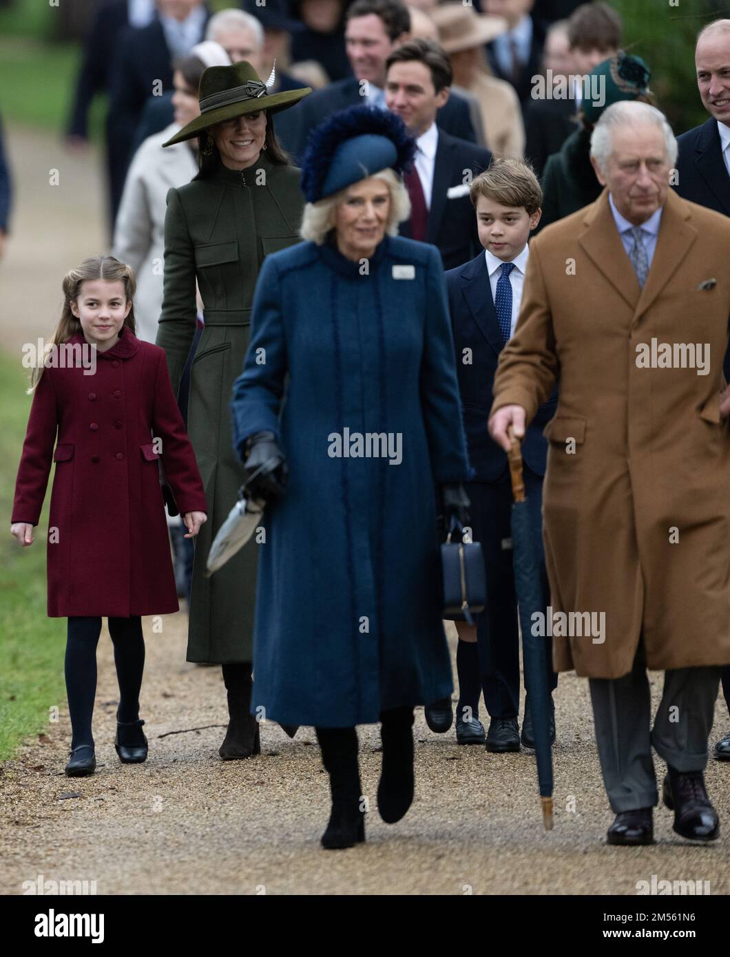 Sandringham, UK. 25 December, 2022.  Princess Charlotte, Catherine, Princess of Wales, Camilla, Queen Consort,  Prince George, King Charles III and Pr Stock Photo