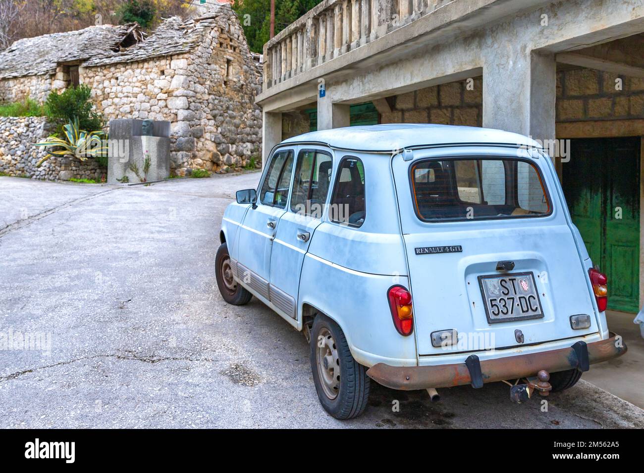 Vintage car Renault 4 in croatian village Stock Photo