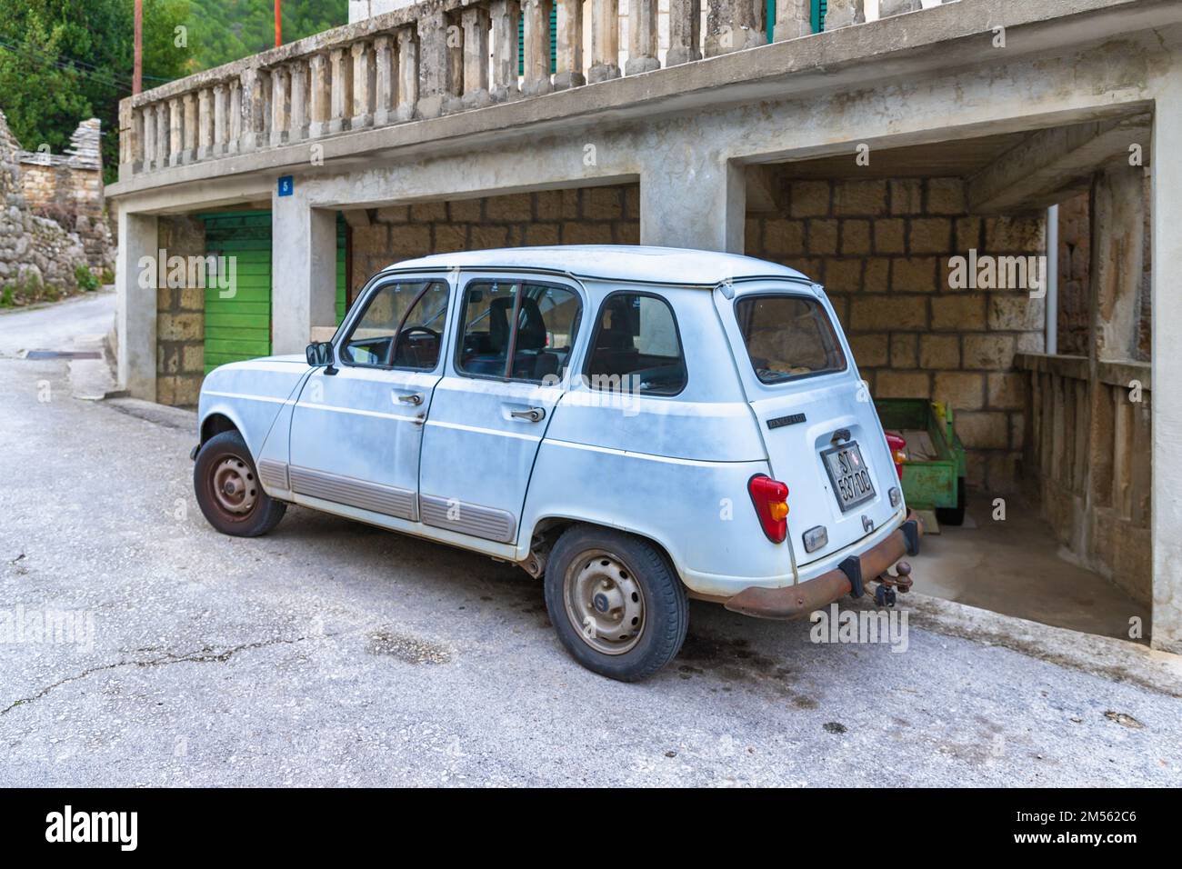 Vintage car Renault 4 in croatian village Stock Photo