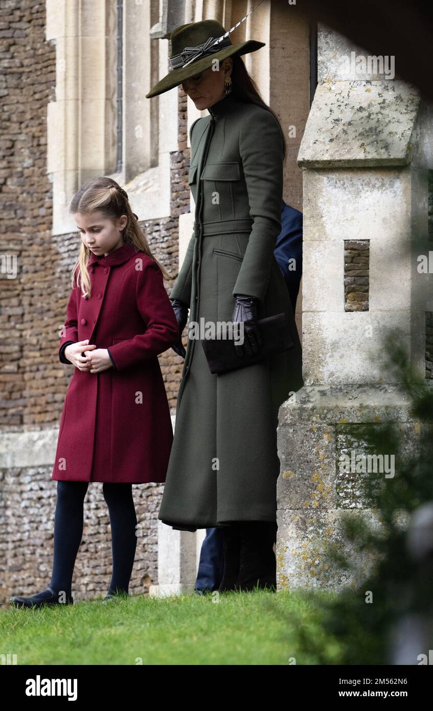 Sandringham, UK. 25 December, 2022.  Catherine, Princess of Wales and Princess Charlotte leave church following the Christmas Day service at Sandringh Stock Photo
