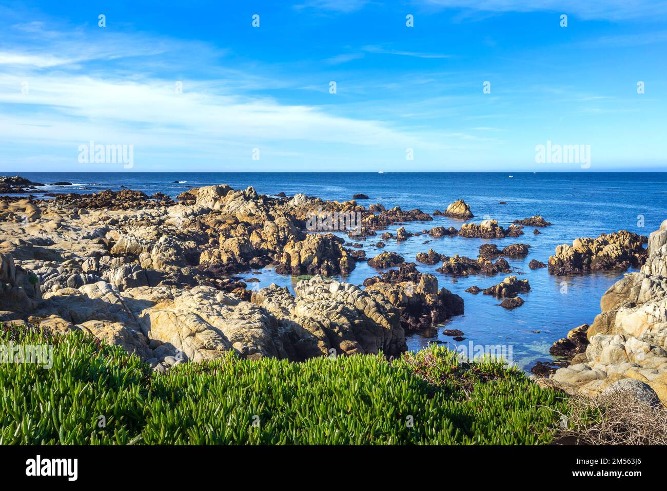 Rocks and boulders on a California ocean coastline in the Monterey Bay ...