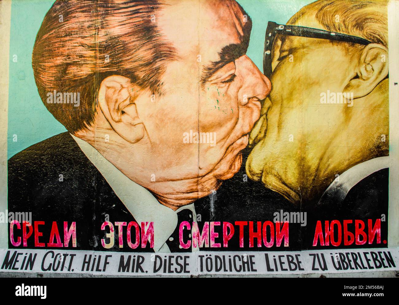 Fraternal kiss between Brezhnev and Honecker in East Side Gallery, Berlin  Stock Photo - Alamy