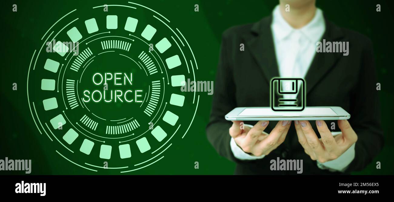 Hand writing sign Open Source. Business concept denoting software which original source code freely available Stock Photo