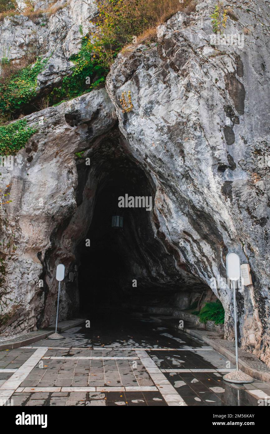 Karst cave entrance Postojnska-Jama in Slovenia Stock Photo