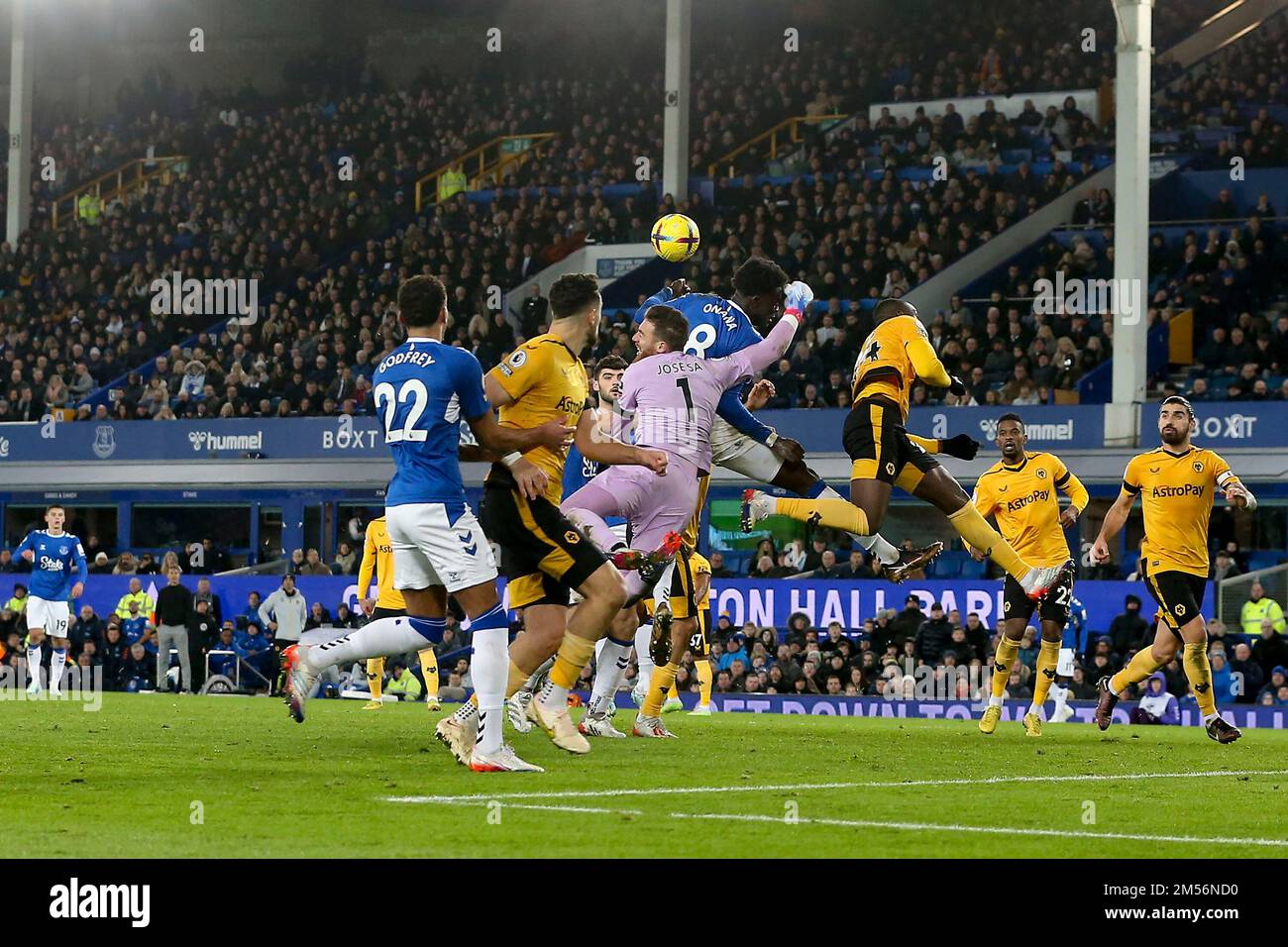 Everton, UK. 26th Dec, 2022. Jose Sa, the goalkeeper of Wolverhampton Wanderers gets to the ball just ahead of Amadou Onana of Everton. Premier League match, Everton v Wolverhampton Wanderers at Goodison Park in Liverpool on Boxing Day, Monday 26th December 2022. this image may only be used for Editorial purposes. Editorial use only, license required for commercial use. No use in betting, games or a single club/league/player publications. pic by Chris Stading/Andrew Orchard sports photography/Alamy Live news Credit: Andrew Orchard sports photography/Alamy Live News Stock Photo