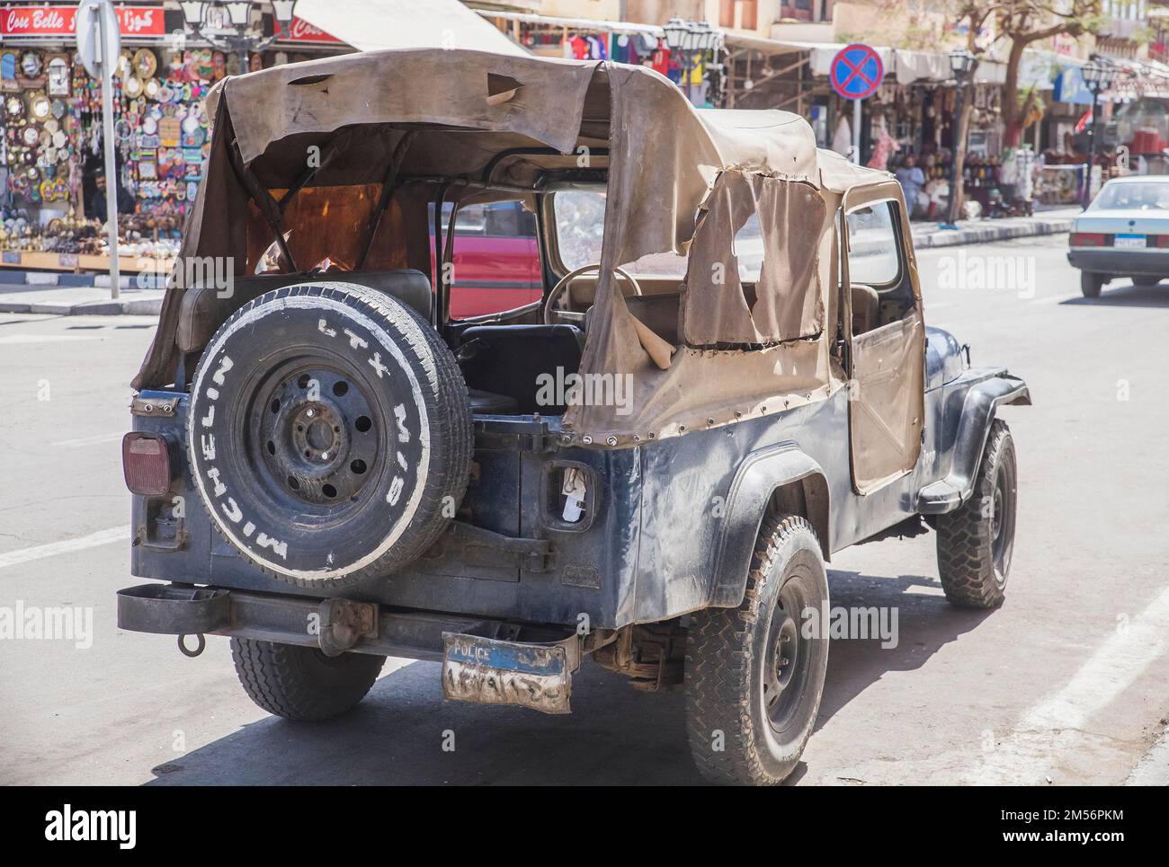 old police SUV with a leaky roof in the Old town Stock Photo