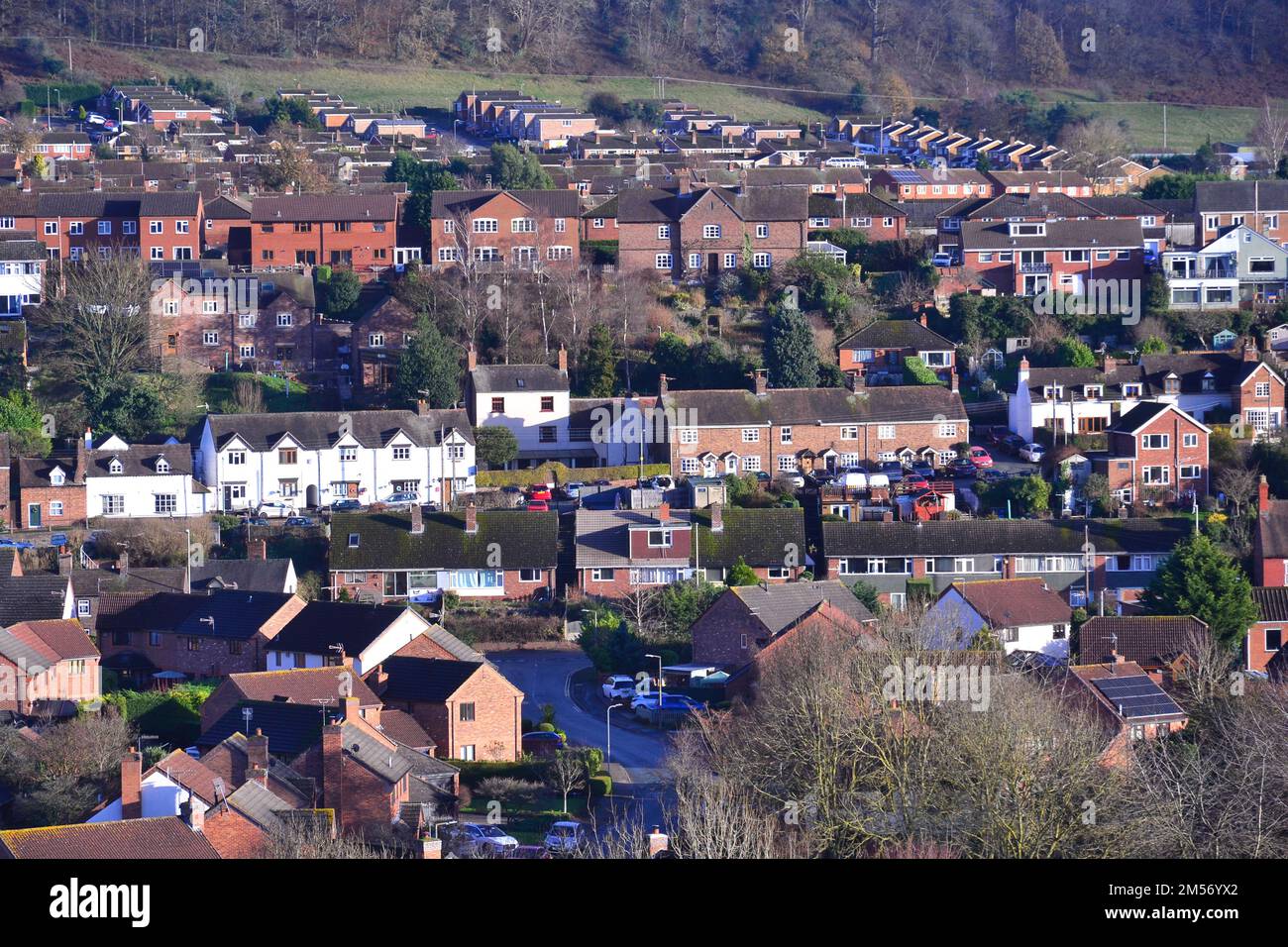 UK Weather Bright sunshine, on distant housing and houses in