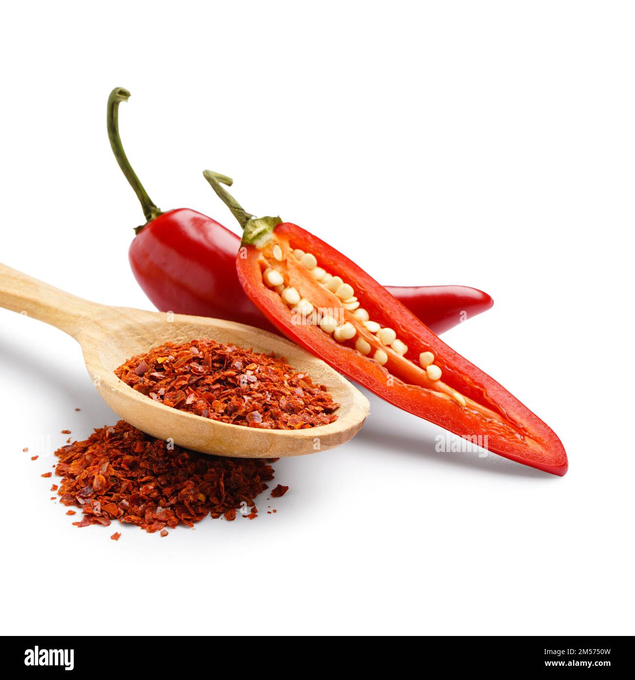 Spoon of chipotle chili flakes on white background Stock Photo Alamy