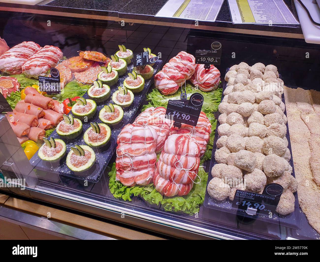 Bergamo, Italy - April 29, 2022: Food selection in Italian Iper supermarket. Fresh meat and veal display. Stock Photo