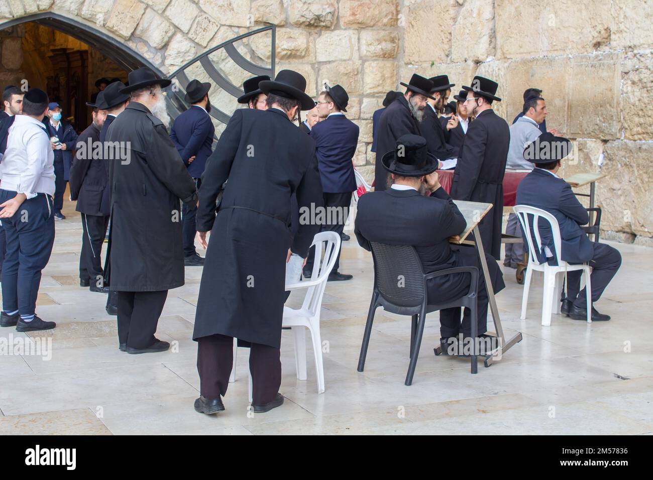 10 Nov 2022 A small group of Hasidic Jews gathered  for prayers, readings and various devotions in a corner of the Western Wall Plaza in Jerusalem Isr Stock Photo