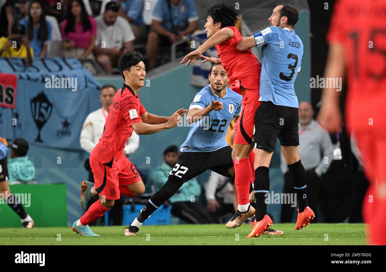 Guesung CHO, Heungmin SON, Martin CACERES, Diego GODIN in action during the FIFA 2022 World Cup group match between Uruguay v Korea Republic, Education City Stadium, Doha, 24/11/2022 Featuring: Guesung CHO, Heungmin SON, Martin CACERES, Diego GODIN Where: Doha, Qatar When: 24 Nov 2022 Credit: Anthony Stanley/WENN Stock Photo