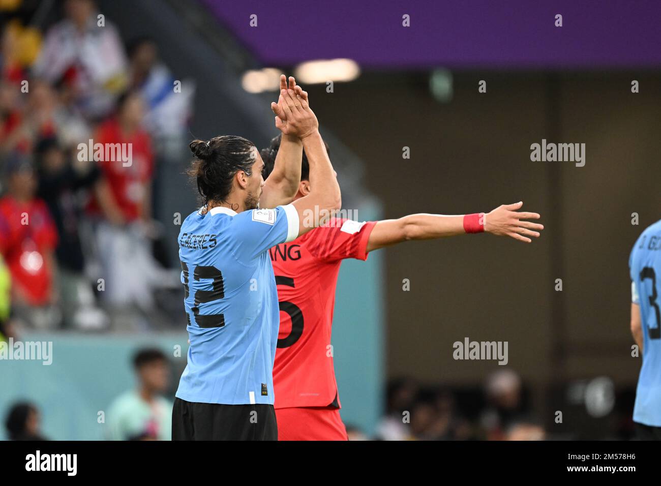 Martin CACERES, Wooyoung JUNG in action during the FIFA 2022 World Cup group match between Uruguay v Korea Republic, Education City Stadium, Doha, 24/11/2022 Featuring: Martin CACERES, Wooyoung JUNG Where: Doha, Qatar When: 24 Nov 2022 Credit: Anthony Stanley/WENN Stock Photo