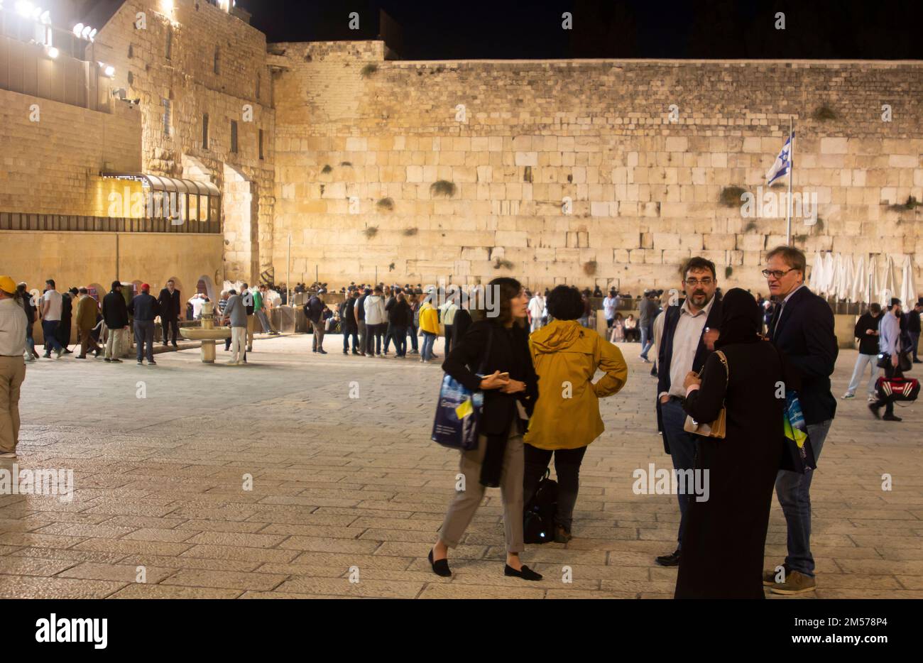 10 Nov 2022  Visitors to the Western Wall Jerusalem Israel throng on the Plaza in the early evening as darkness descends Stock Photo