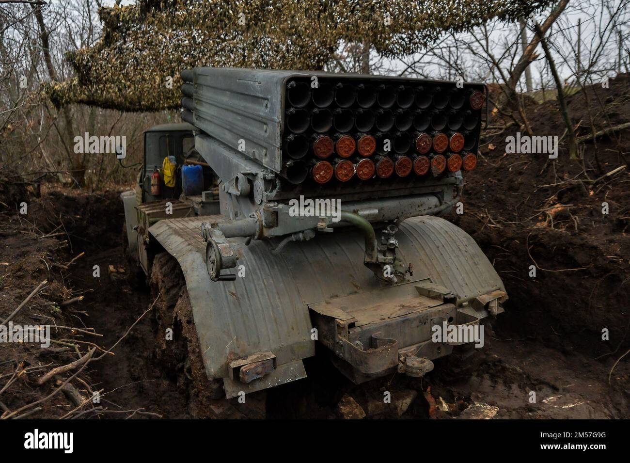 Ukraine. 26th Dec, 2022. Hiding among the trees near Soledar sits a Ukrainian multiple launch rocket system. As fighting in Donbas continues, the use of artillery increases. (Photo by Madeleine Kelly/SOPA Images/Sipa USA) Credit: Sipa USA/Alamy Live News Stock Photo
