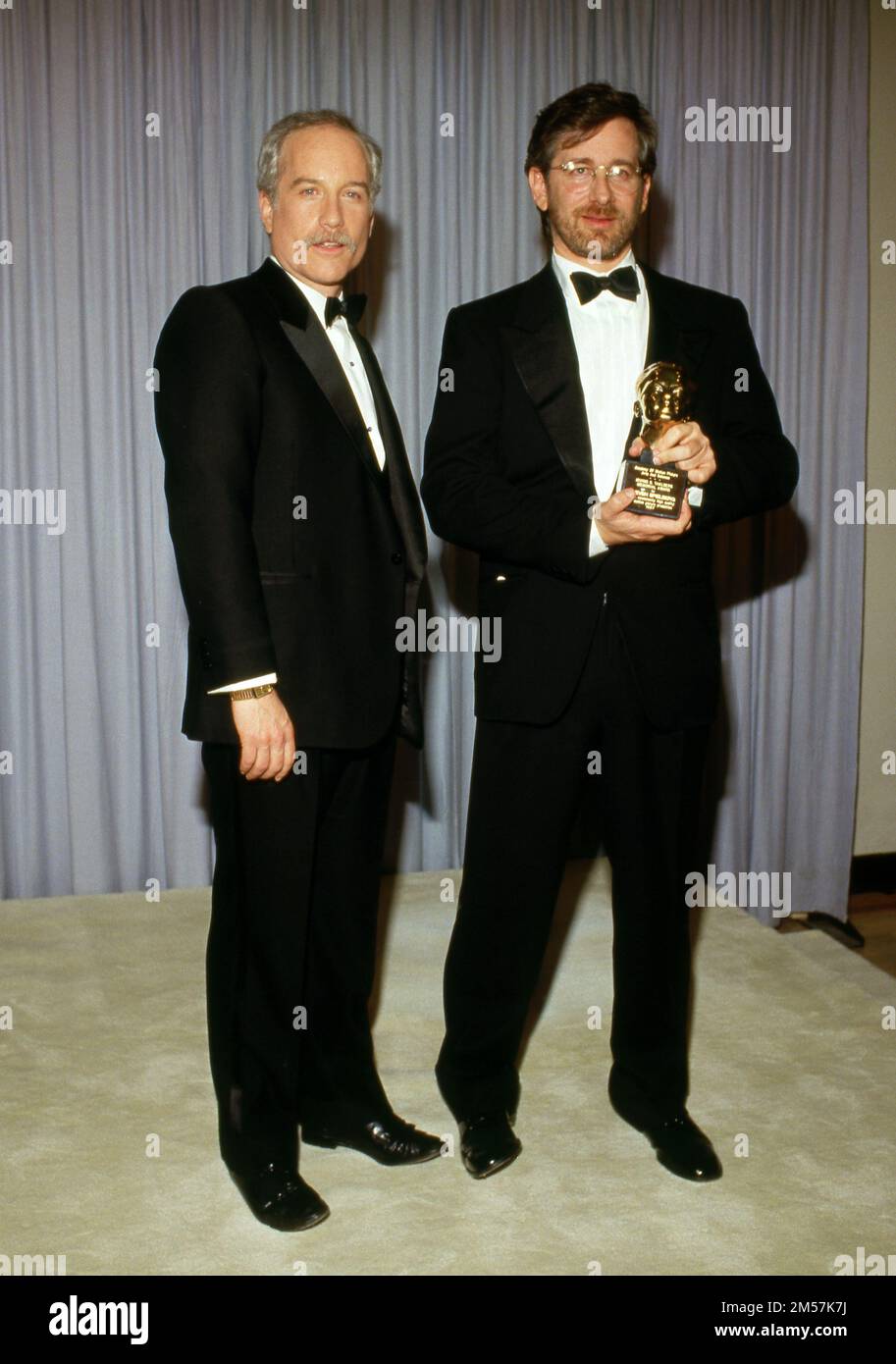 Richard Dreyfuss with Steven Spielberg holding his Irving G. Thalberg Memorial Award at the 59th Academy Awards on March 30, 1987, at the Dorothy Chandler Pavilion in Los Angeles Credit: Ralph Dominguez/MediaPunch Stock Photo