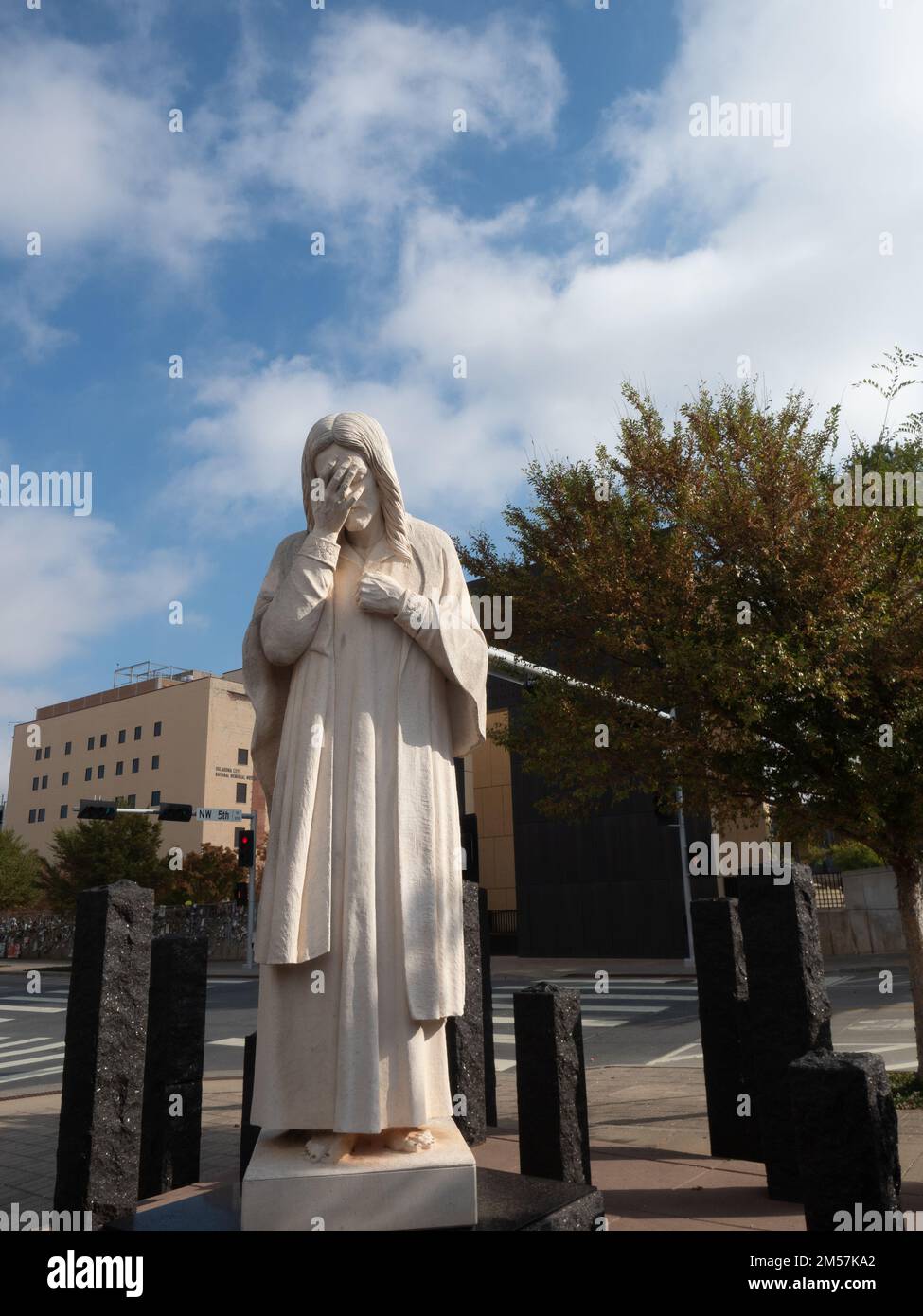"And Jesus Wept" statue erected by the St. Joseph Catholic Church