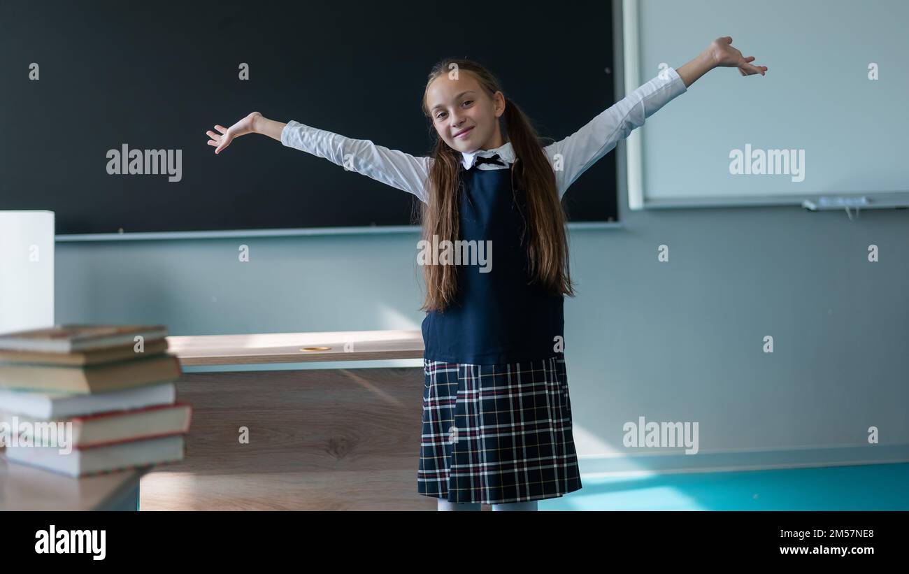 Preteen arms up hi-res stock photography and images - Alamy