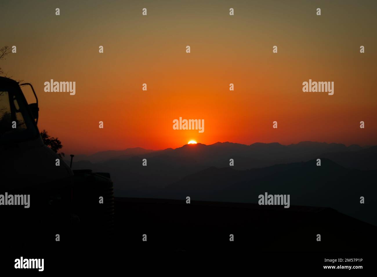 View From Rupakot A mesmerizing Sunset view from silhouette Rupakot Resort, Nepal with ...