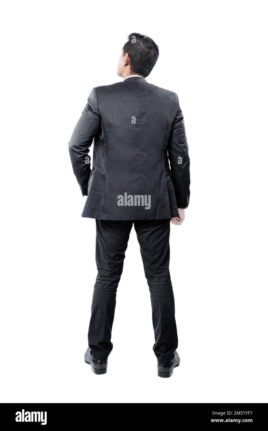 Rear view of Asian businessman standing isolated over white background ...