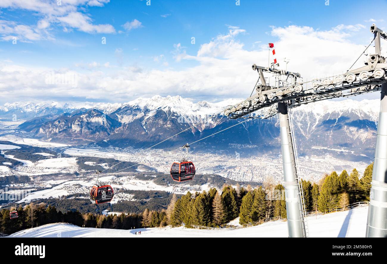 A cable car over the snowy Patscherkofel mountain on a sunny day in  Innsbruck, Austria Stock Photo - Alamy