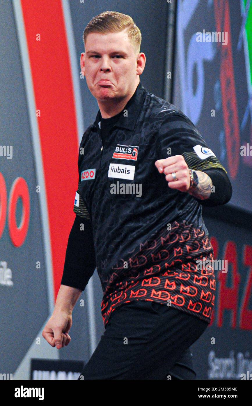 LONDON, UNITED KINGDOM - DECEMBER 18: Mike De Decker of Belgium reacts  during his First Round match at the 2022/23 Cazoo World Darts Championship  at Alexandra Palace on December 18, 2022 in