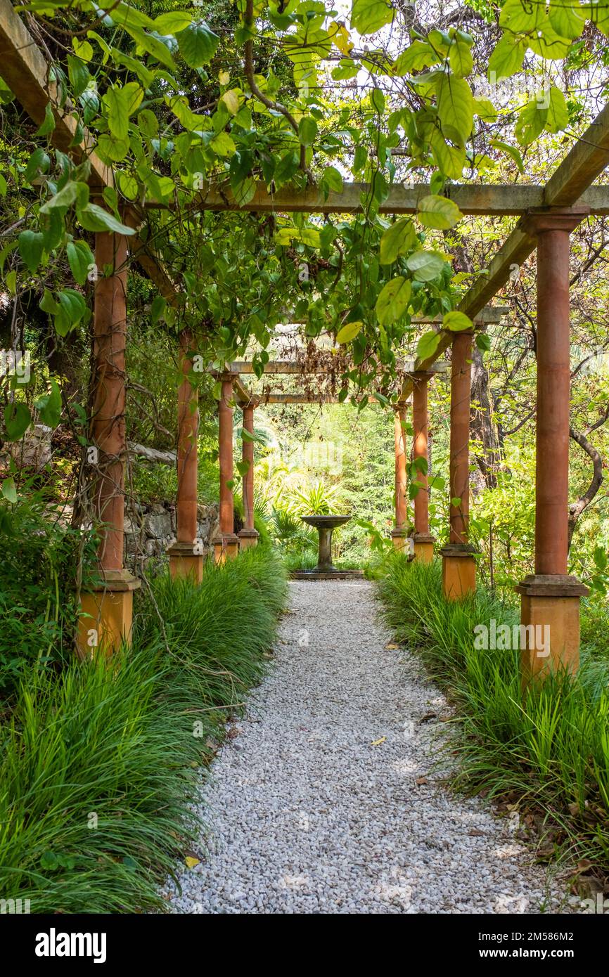 Menton, France - May 2, 2022: A pergola at the Val Rhameh botanical garden. Taken on a sunny spring day with no people Stock Photo
