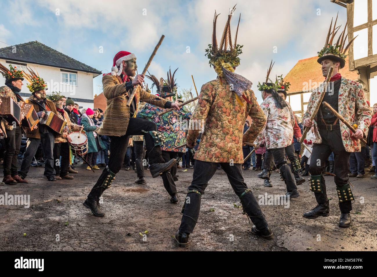 Pembridge, Herefordshire, UK. Members of the Leominster Morris giving their annual Boxing Day performance at the New Inn in the centre of the village Stock Photo