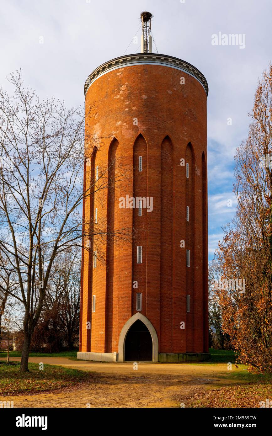 Brick-built constructed circular water tower. Rue du 6 Février 1945. Ensisheim, Alsace, France. Stock Photo