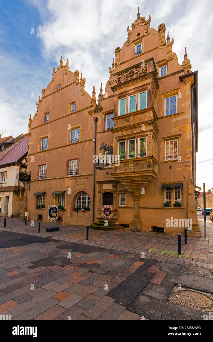 Street view of the La Couronne hotel. It was built in 1610 in a Renaissance style. The building is one of the most remarkable of Ensisheim, Alsace, Fr Stock Photo