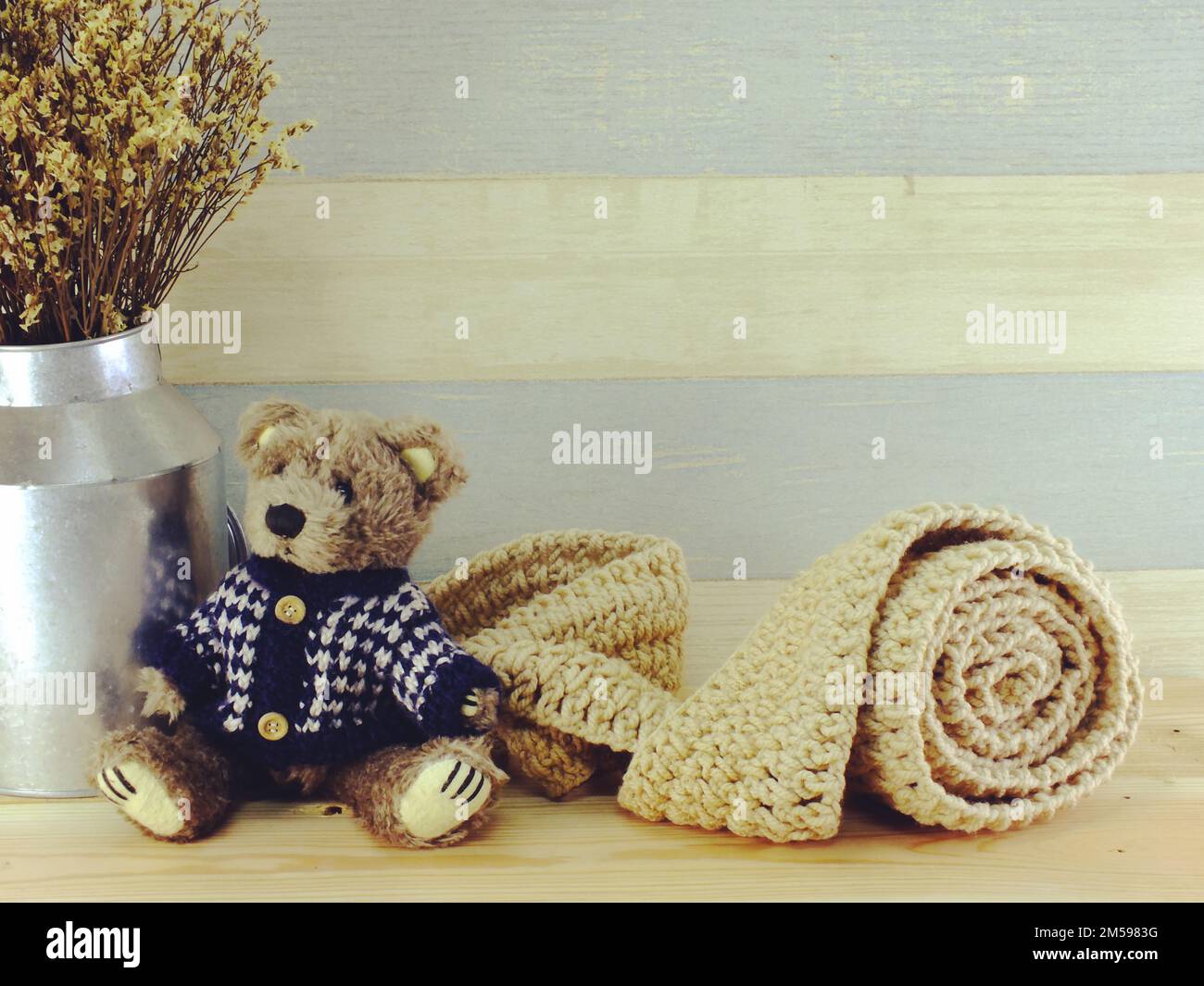 teddy bear with scarf and copy space background Stock Photo - Alamy