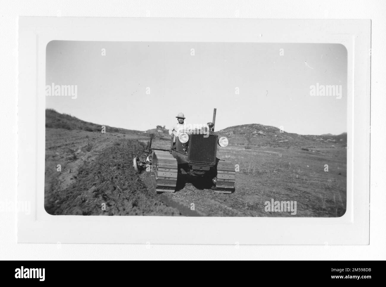 Original caption: 'New 'WM' Allis-Chalmers tractor and equipment purchased by the Barona Group of the Capitan Grande Indians'. 1936 - 1942. Pacific Region (Riverside, CA). Photographic Print. Department of the Interior. Office of Indian Affairs. Mission Agency. 11/15/1920-6/17/1946. Photographs Stock Photo