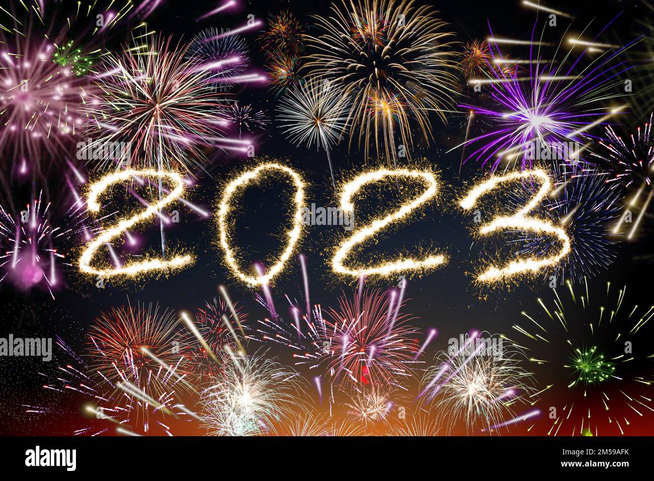 Fireworks in the night sky, New Year 2023 Stock Photo